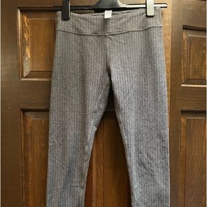 Ivivva leggings size 14 in a houndstooth like pattern.  See pics